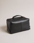 HANSS-Gifts-Crafted from Saffiano leather, the HANSS washbag has internal mesh pockets and a top handle for easy travelling. Sleek branded hardware completes the look. Washbag Saffiano leather Top handle Logo hardware on front Zip fastening Internal mesh pockets Dimensions: 24cm x 13cm x 13cm- Ted Baker Romania